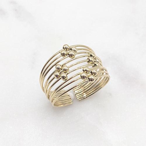 Bague en acier inoxydable doré avec design multi-anneaux et perles, élégance contemporaine et confort ajustable
